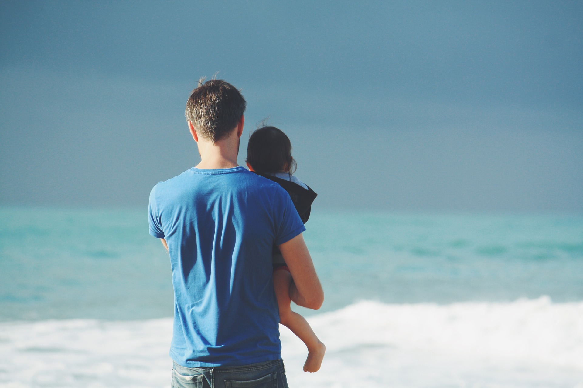 Father and Daughter on the Beach